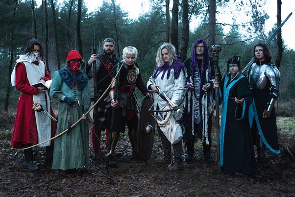 2 members of each corrupted faction are arrayed looking toward the camera.